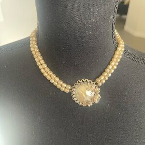 Elegant Pearl Necklace with Gold Accents